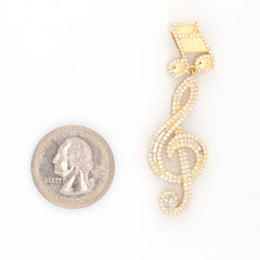 MUSIC NOTE BAGUETTE & ROUND DIAMOND PENDANT - 10KT YELLOW GOLD & 1.25 CTW