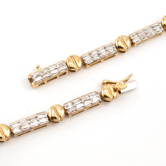 WOMEN'S VINTAGE TENNIS BAGUETTE DIAMOND NECKLACE - 10KT YELLOW GOLD & 4.98CTW