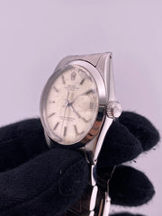 Rolex Oyster Perpetual Date Silver Stick Dial on Oyster Steel Bracelet Ref. 1500 1966