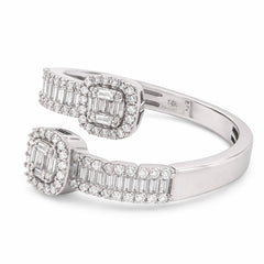 Ladies 14k White Gold 4gm 0.5CTW Pure Round/Baguette Diamond Bypass Diamond Ring