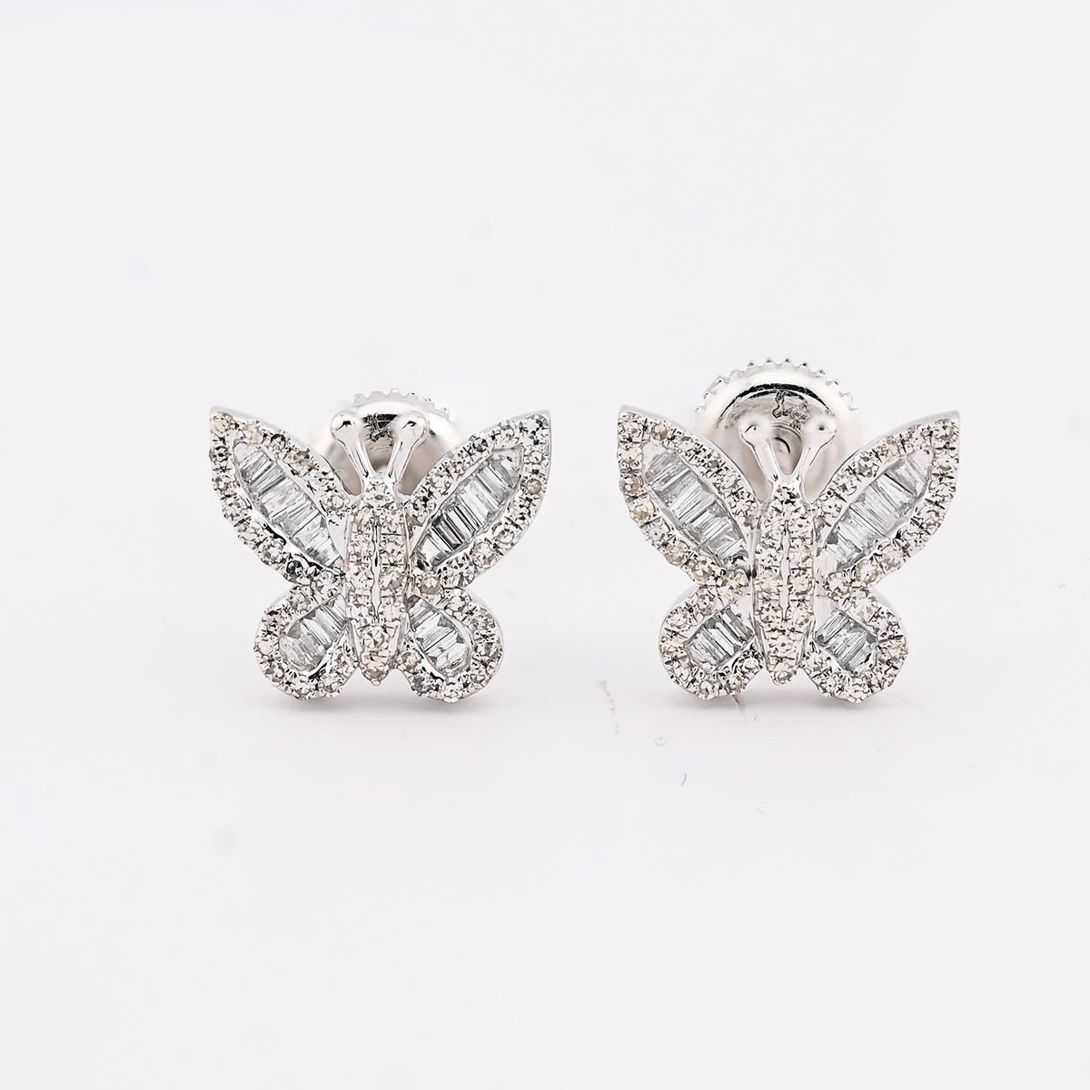 10k White Gold 0.44CTW Round/Baguette Natural Diamond Butterfly 2.2gms Stud