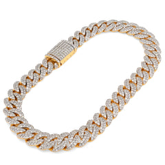 Gold and diamond bracelet on a white background