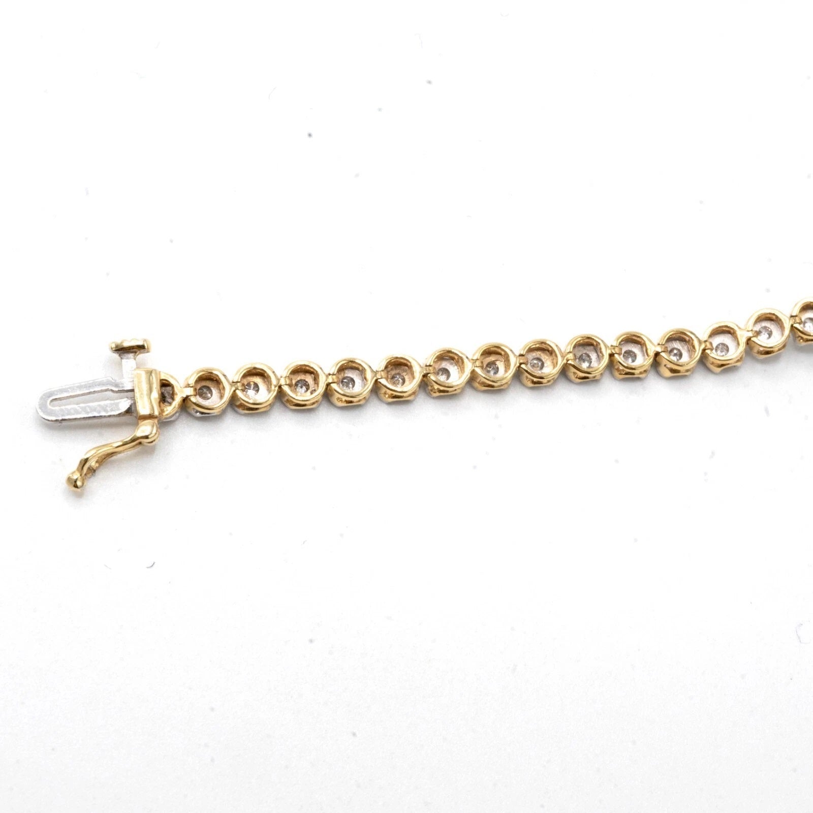 10k Yellow Gold 0.75CTW Diamond Graduating 11MM Clove Tennis Bracelet - 7 Inches