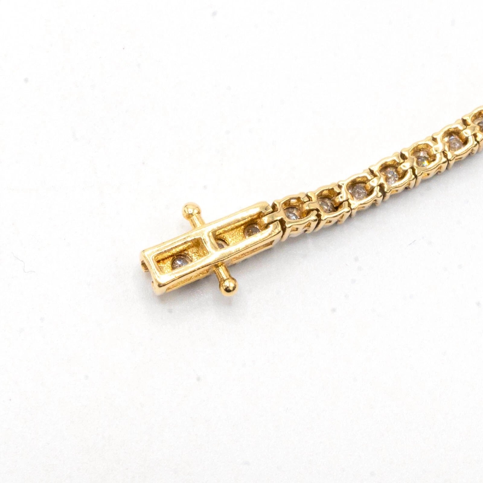 3MM 10k Yellow Gold 2.85CT Diamond 3 Graduating 16MM Heart 7.5" Tennis Bracelet